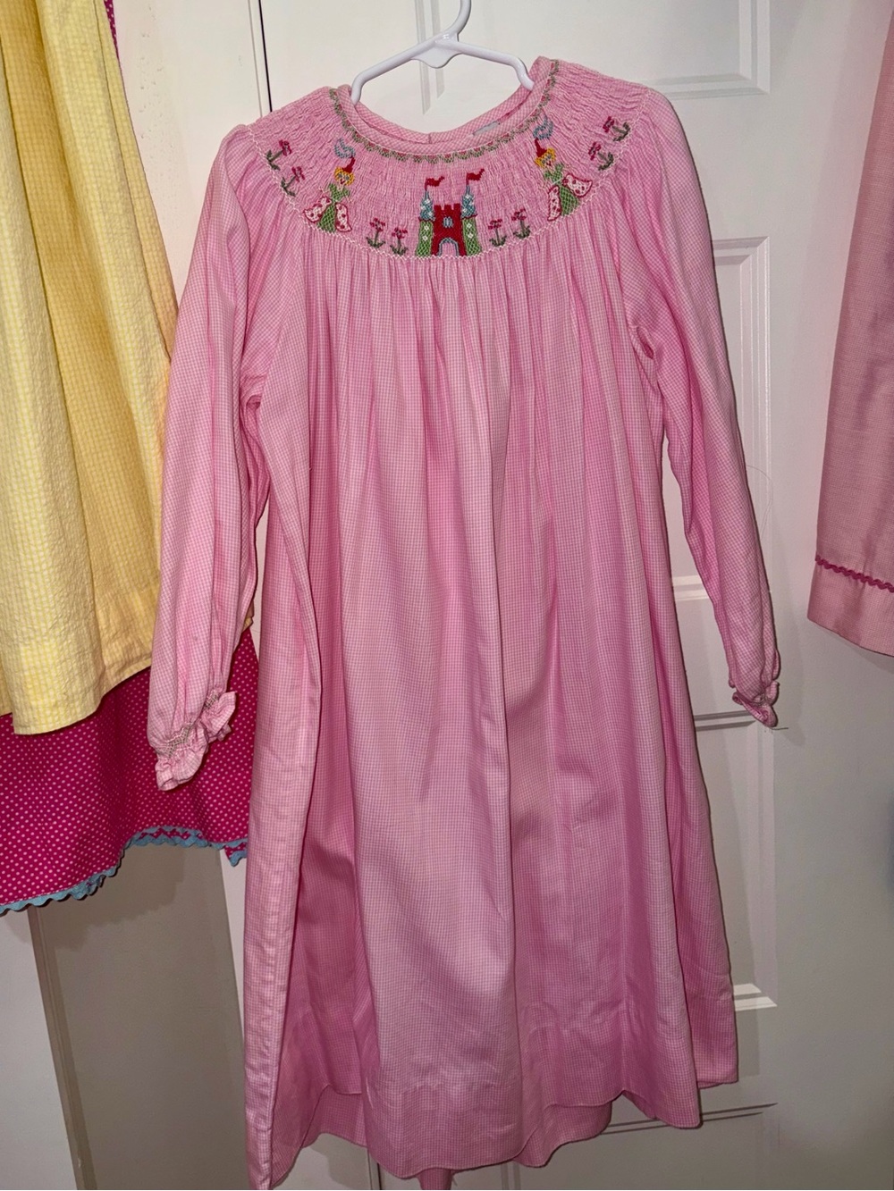 Classic Girls' Pink Smocked Long-Sleeve Dress with Princess Design